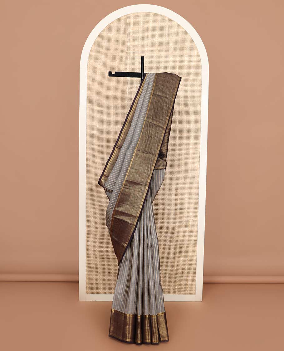 Grey zari striped Vasundhara silk mix saree, contrast zari border of muthu stripes, and zari-rich pallu