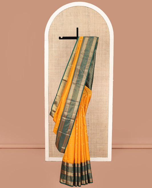 Orange Vasundhara Lite Silk Mix Saree, Artfully Detailed with Zari Buttas Enclosed Checks on Its Body, Complemented by a Contrast Border of Poo Chakram Designs, Intricately Designed Jaal Pallu, and Paired with a Contrast Blouse