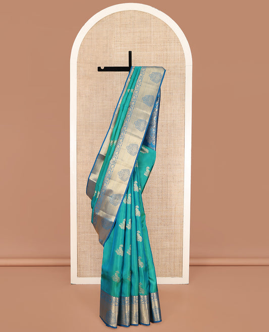 Green Vasundhara Lite Silk Mix Saree, Prettified with Zari Buttas on Its Body, Complemented by a Contrast Traditional Zari Border, Pallu of Floral Designs, and Paired with a Contrast Blouse