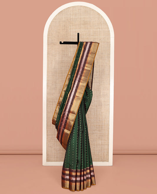 Green Vasundhara Lite Silk Mix Saree, Decorated with Zari Buttas All Over Its Body, Complemented by a Contrast Border of Muthu, Yaali, and Mayil Designs, Grand Geometric-Design Pallu, and Paired with a Contrast Blouse