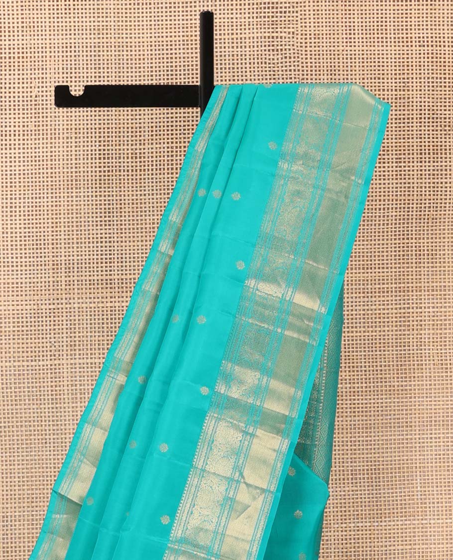 Blue zari buttas Vasundhara silk mix saree, zari border of rekku, kodi visiry, and kuyil kann designs, and jaal pallu