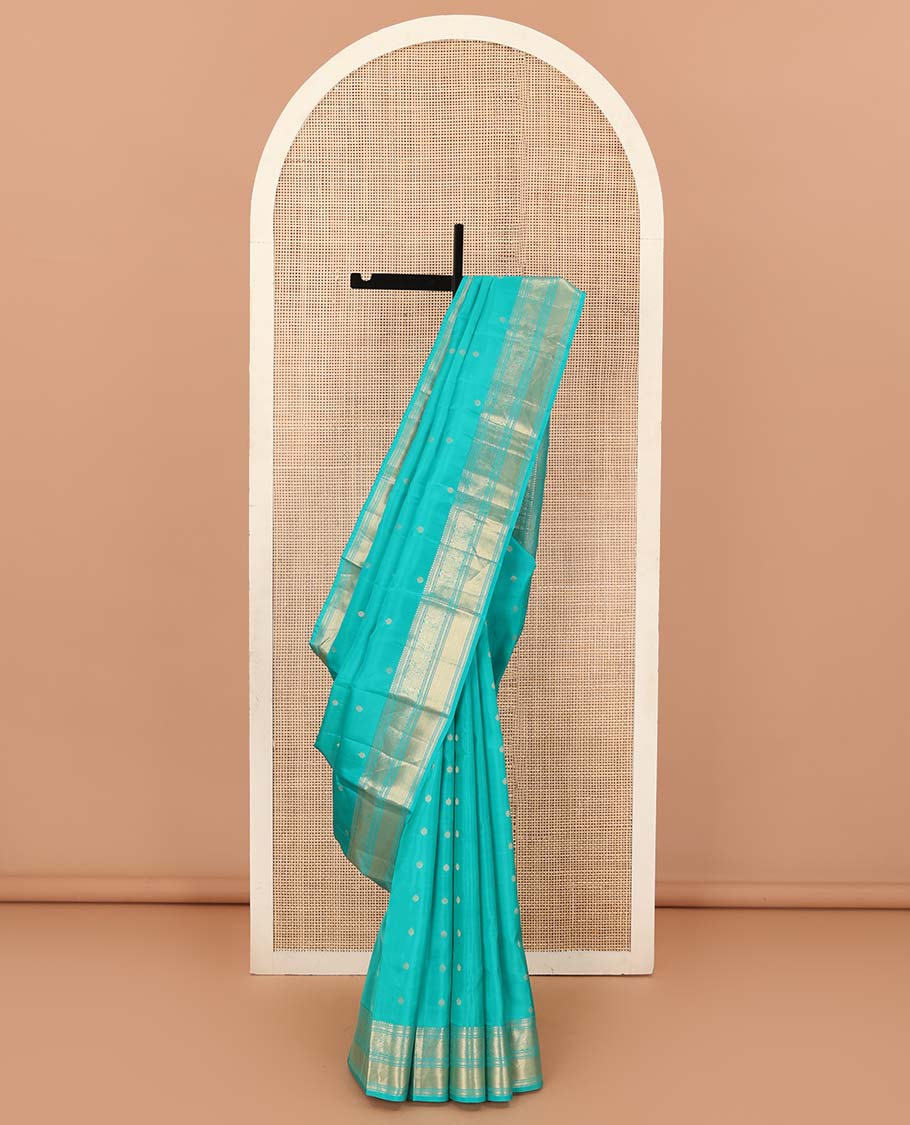 Blue zari buttas Vasundhara silk mix saree, zari border of rekku, kodi visiry, and kuyil kann designs, and jaal pallu