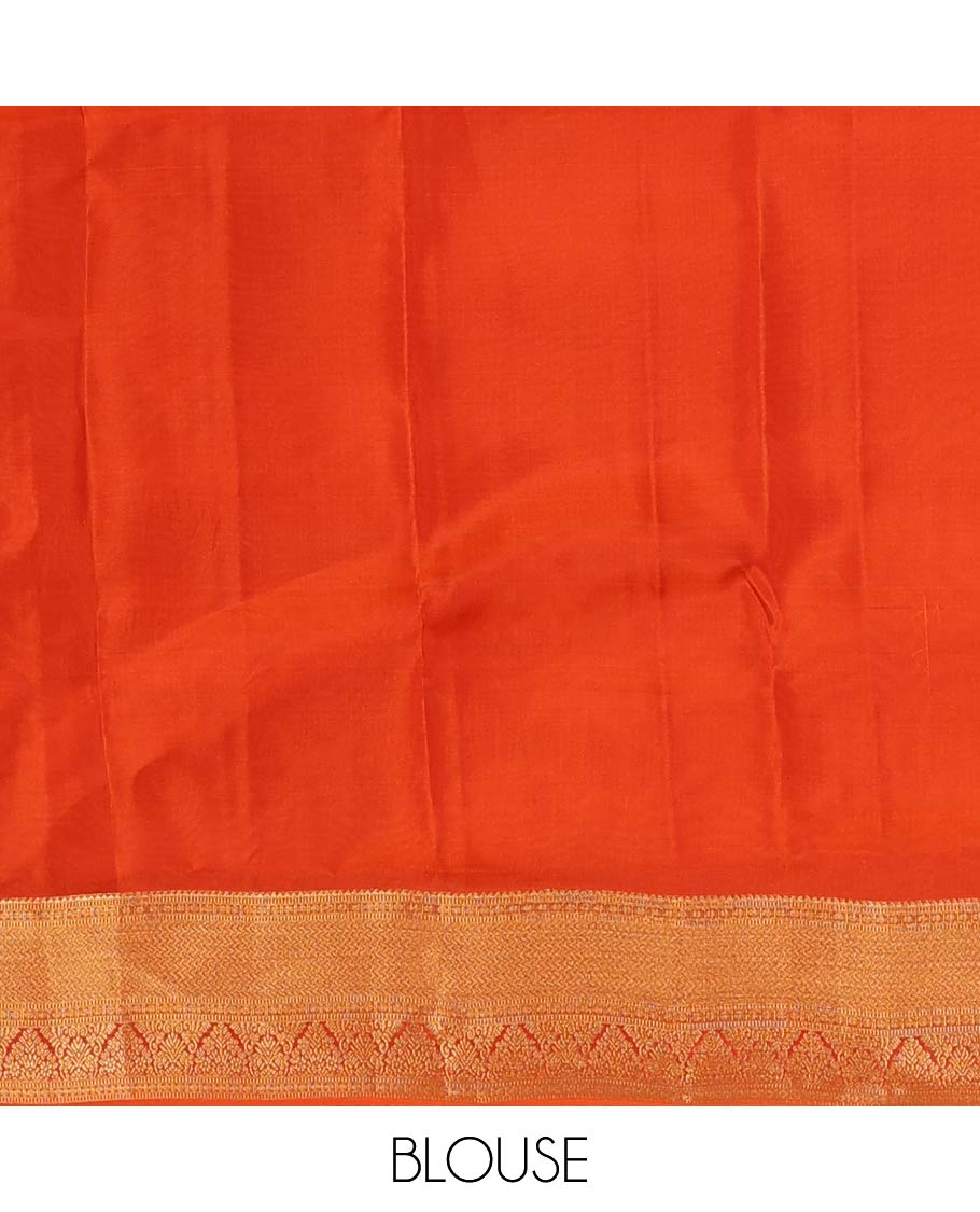 Orange zari buttas Vasundhara silk mix saree, contrast border of rekku, muthu, poun, vanki, and zari designs, and leaf vine design pallu