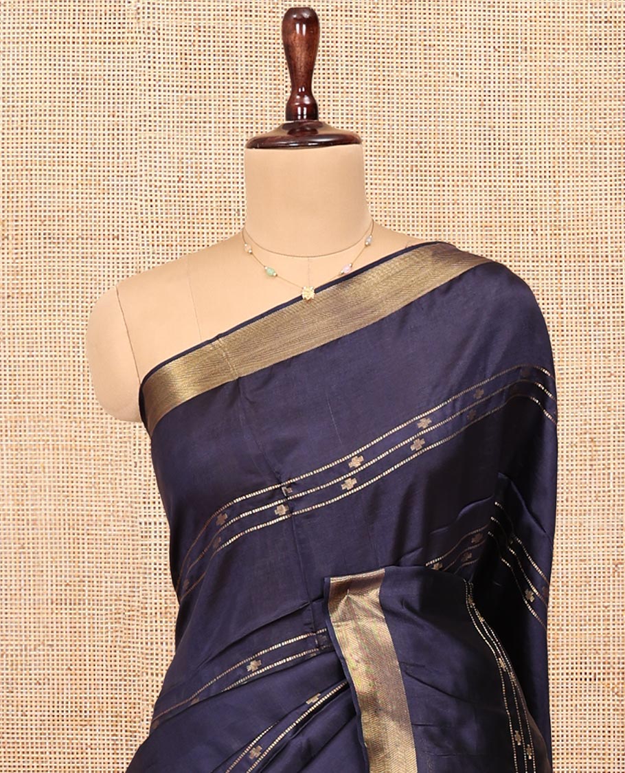 Blue Banana Pith Saree, Uniquely Detailed with Buttas and Stripes All Over Its Body, Highlighted by a Zari Temple Border, Gleaming Zari-Striped Pallu, and Paired with a Matching Blouse