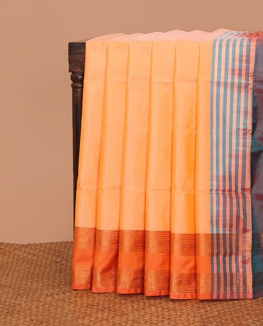 Orange thread buttas banana pith saree, contrast traditional zari border, and contrast pallu of stripes, and buttas