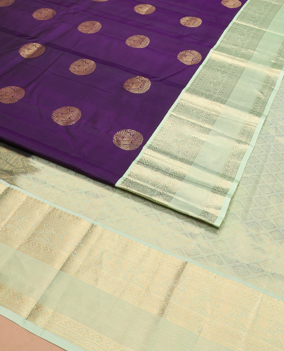 Violet round mayil buttas silk saree, contrast korvai border of thilakam, muthu, diamond, neli, mayil, and diamond designs, and jaal pallu
