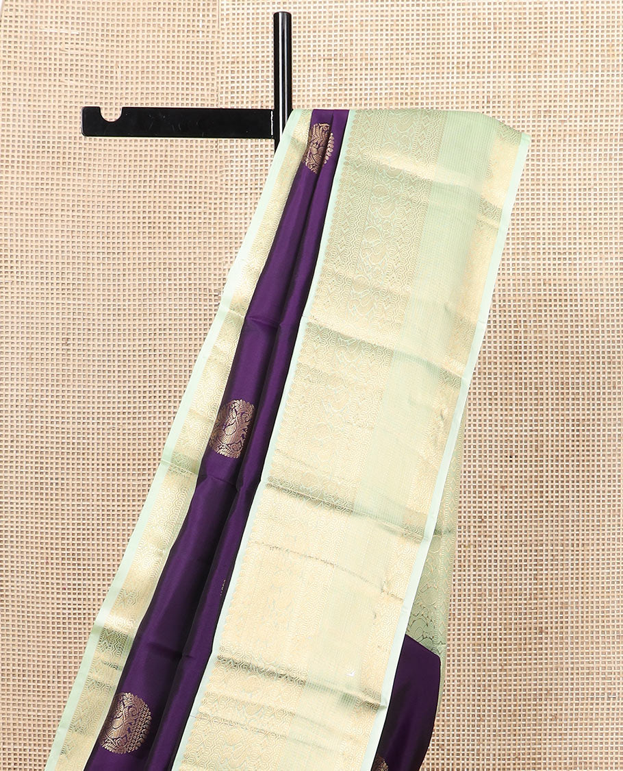 Violet round mayil buttas silk saree, contrast korvai border of thilakam, muthu, diamond, neli, mayil, and diamond designs, and jaal pallu