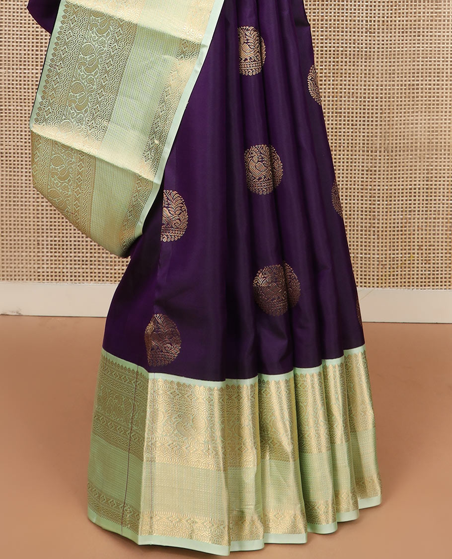 Violet round mayil buttas silk saree, contrast korvai border of thilakam, muthu, diamond, neli, mayil, and diamond designs, and jaal pallu