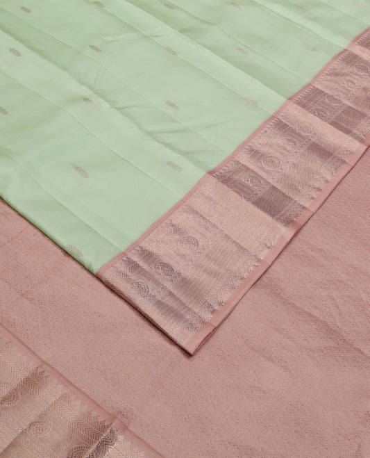 Green zari buttas silk saree, contrast border of thilakam,banaras, manga & chakram designs & pallu of jaal design