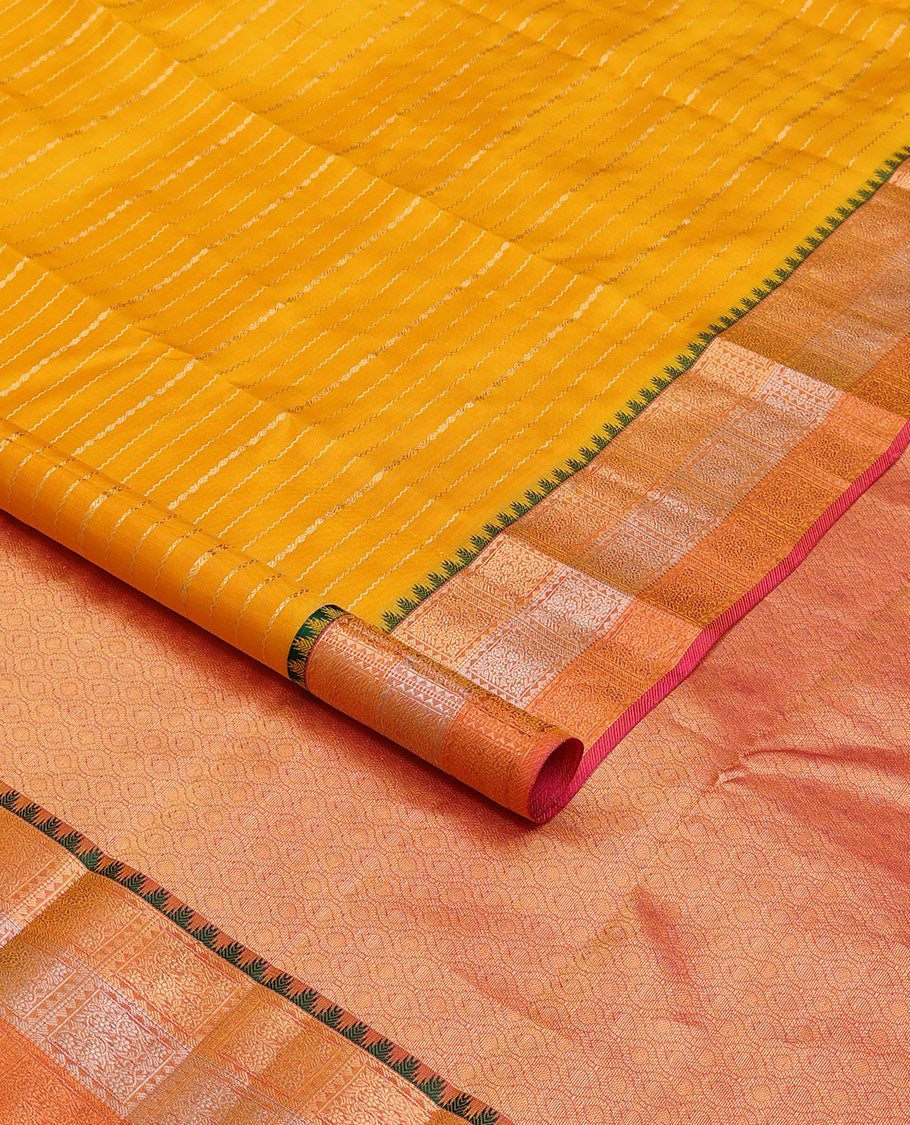 Yellow zari buttas silk saree, contrast ogee patterned pallu &  floral jaal enclosed checked thazampoo rekku border