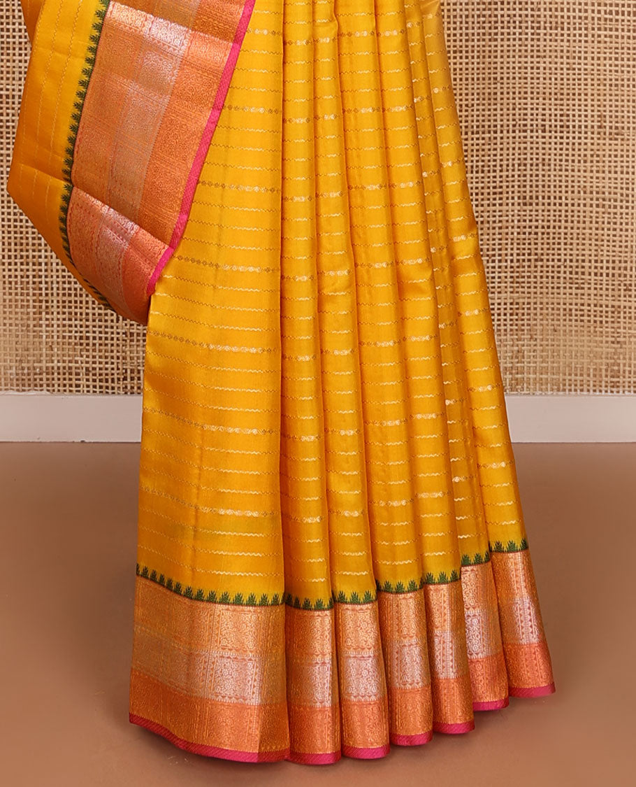 Yellow zari buttas silk saree, contrast ogee patterned pallu &  floral jaal enclosed checked thazampoo rekku border