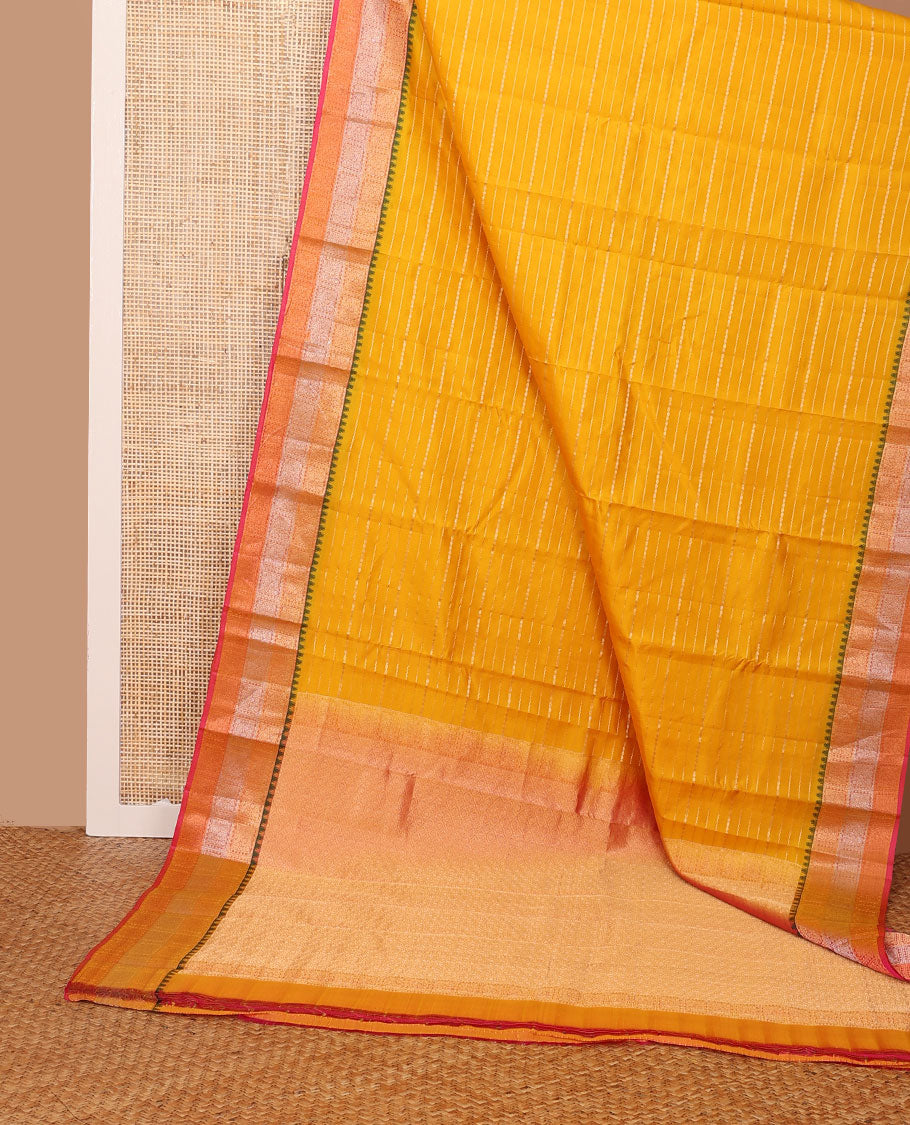 Yellow zari buttas silk saree, contrast ogee patterned pallu &  floral jaal enclosed checked thazampoo rekku border