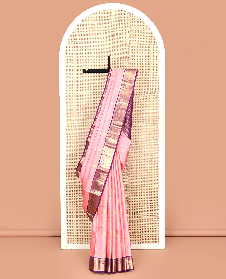 Pink Vasundhara Silk Saree, Entralled with Zari Butta Enclosed Checks On Its Body, Complemented by Contrast Border of Rekku, Muthu, Kodi Visiry, and Mayil Kann Designs, Grand Jaal Pallu and Paired with a Contrast Blouse
