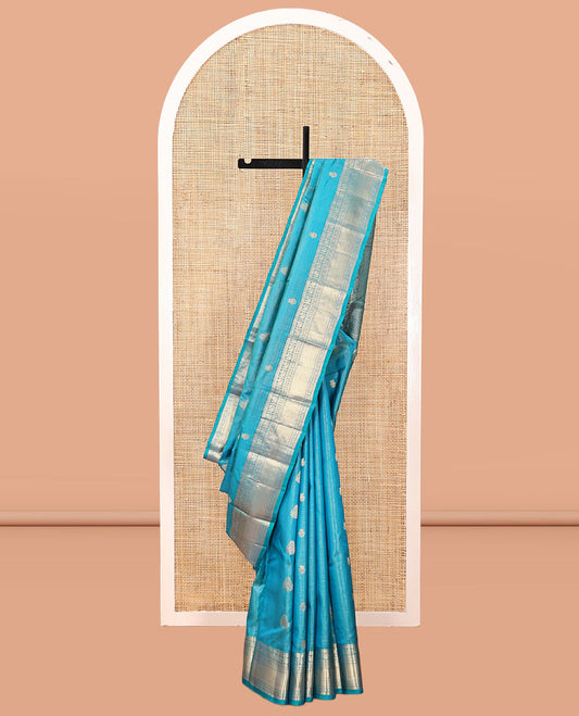 Blue Vasundhara Silk Saree, Woven with Zari Buttas and Vaira Oosi Stripes, a Traditional Zari Border, Grand Pallu, and a Matching Blouse