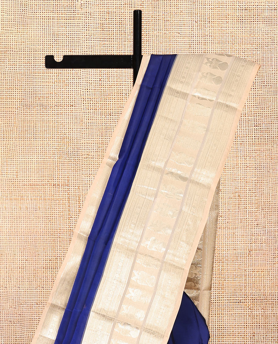 Blue Vasundhara Silk Saree, Woven with Zari Buttas, Contrast Border of Thilakam Mokku, Muthu, Neli, Poun, and Iruthalai Pakshi Designs, Grand Pallu, and Contrast Blouse
