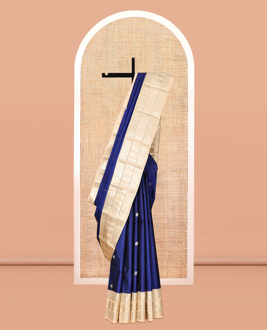 Blue Vasundhara Silk Saree, Woven with Zari Buttas, Contrast Border of Thilakam Mokku, Muthu, Neli, Poun, and Iruthalai Pakshi Designs, Grand Pallu, and Contrast Blouse