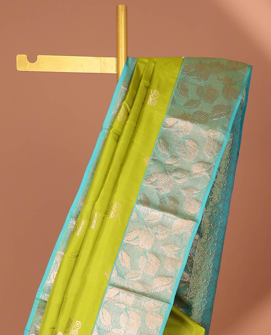 Green floral buttas silk saree with contrast leaf design border &  intricate jaal zari design pallu