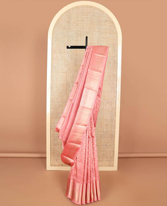 Peach floral jacqaurd kancheepuram silk saree with self intricate zari design border & floral design pallu