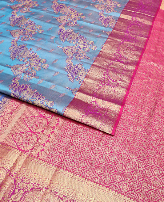 Blue jacquard Kanchipuram wedding silk saree, contrast intricately designed zari border, and Mughal-style intricate pallu