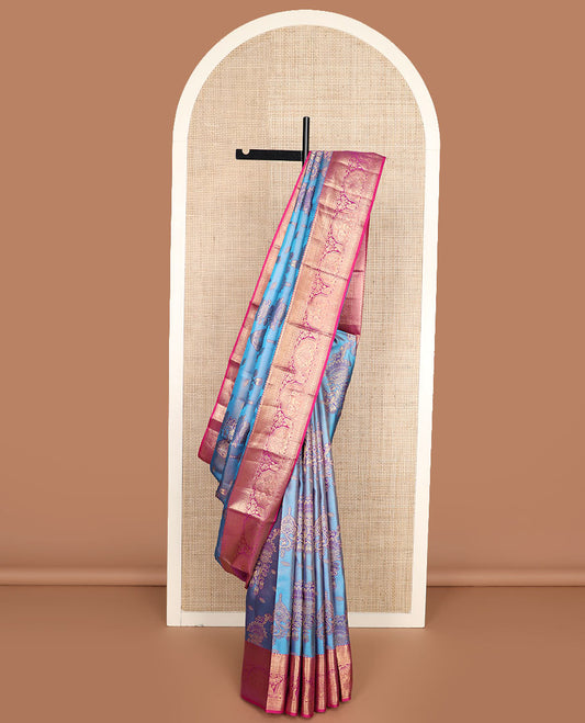 Blue jacquard Kanchipuram wedding silk saree, contrast intricately designed zari border, and Mughal-style intricate pallu