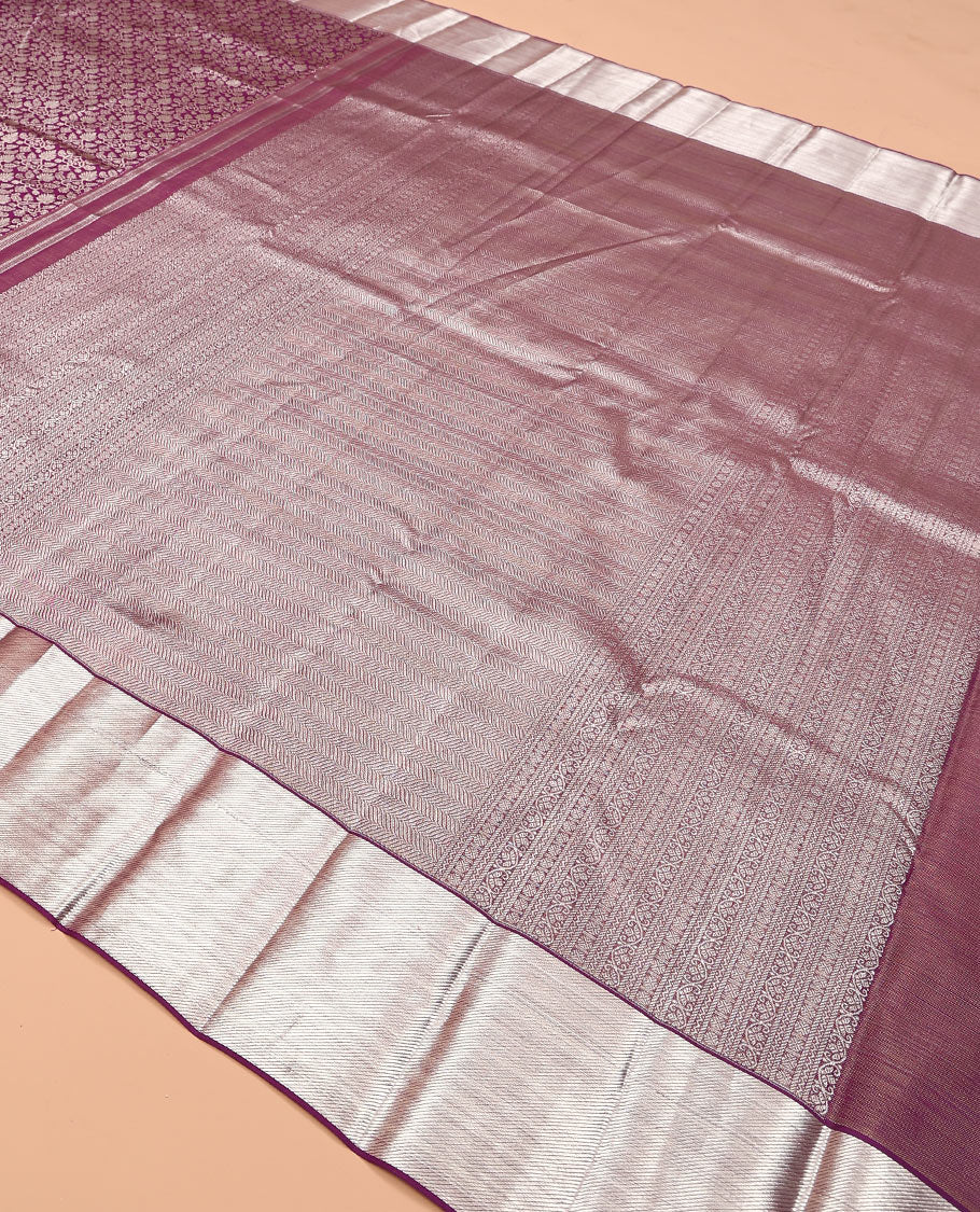 Purple jacquard kanchipuram silk saree, zari border, and zari-rich pallu of vanki designs