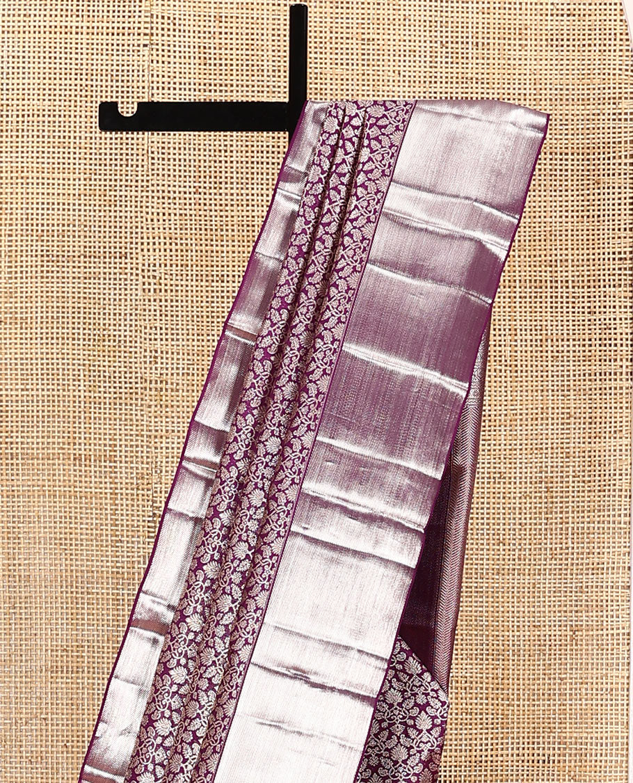 Purple jacquard kanchipuram silk saree, zari border, and zari-rich pallu of vanki designs