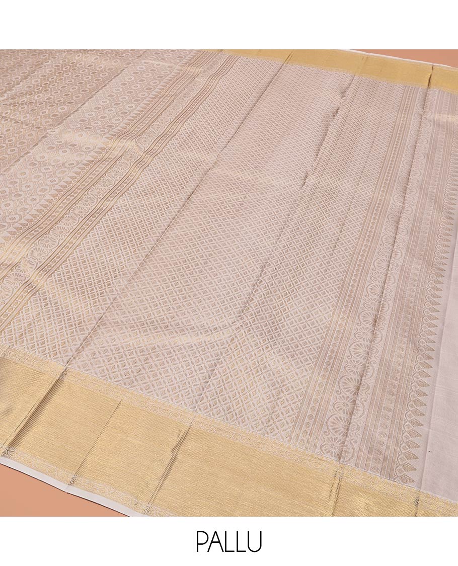 Off-White Kanchipuram Wedding Silk Saree, Finely Woven with Jacquard Design On Its Body, Highlighted by Zari Floral Creeper Design Border, Grand Pallu and Paired with a Matching Blouse