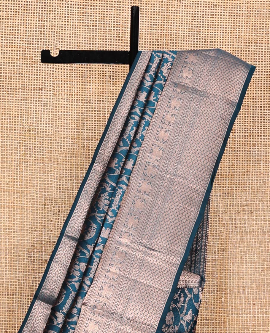 Blue Kanchipuram Wedding Silk Saree, Gracefully Embellished with Jacquard Design on Its Body, Highlighted by Zari Border of Thilakam Mokku, Vanki, Jaal, and Yaali Designs, Grand Jaal Pallu, and Paired with a Matching Blouse