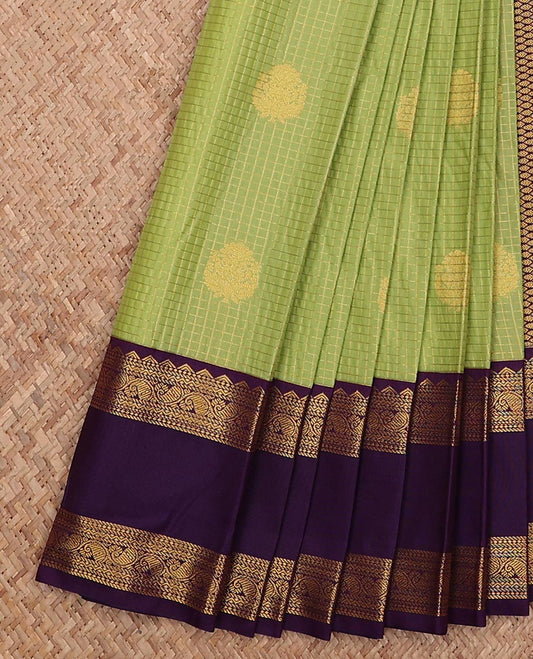 Green micro-checked and buttas gift saree, contrast traditional zari design rettai pettu border, and jaal pallu