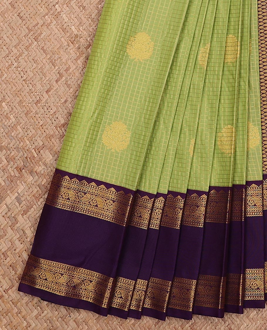 Green micro-checked and buttas gift saree, contrast traditional zari design rettai pettu border, and jaal pallu
