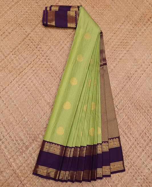 Green micro-checked and buttas gift saree, contrast traditional zari design rettai pettu border, and jaal pallu
