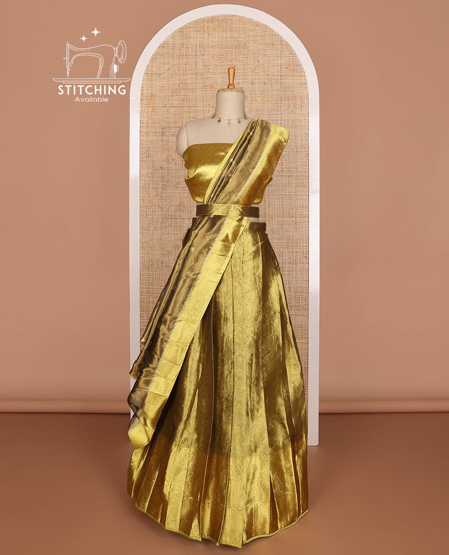 Gold color floral design tissue half saree with contrast zari design border, zari design blouse & floral design dhavani