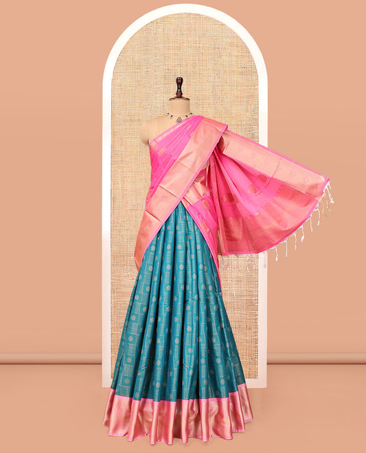 Blue Art Silk Half-Saree Pavadai Material Features Zari Design Skirt, a Contrast Traditional Border, Contrast Blouse, and Intricate Dhavani
