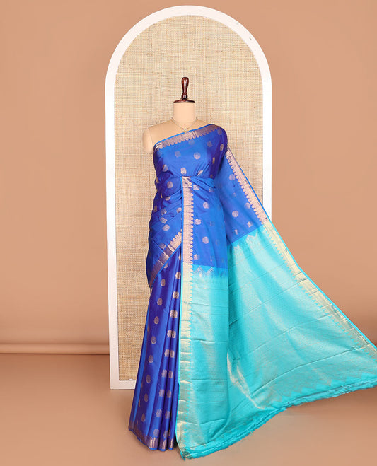 Blue peacock chakram buttas budget silk saree, traditional zari design border, and contrast ogee patterned pallu