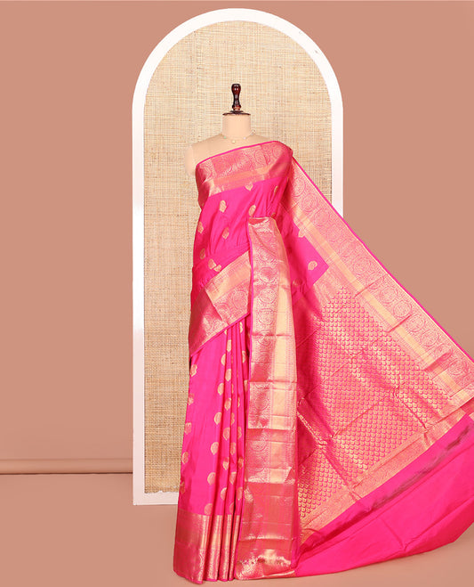 Pink Budget Silk Saree Bedecked with Paisley Buttas All Over Its Body, Highlighted by a Traditional Zari Design Border, Grand Pallu of Jaal Designs, and Paired with a Matching Blouse
