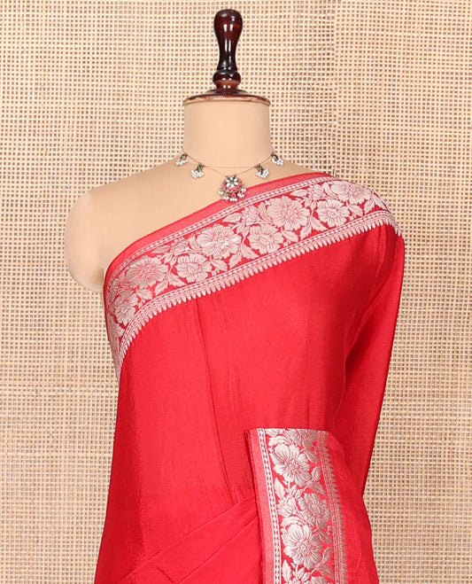Red Plain Fancy Crepe Saree, Highlighted by a Floral Border, Pallu of Floral Designs, and a Matching Blouse