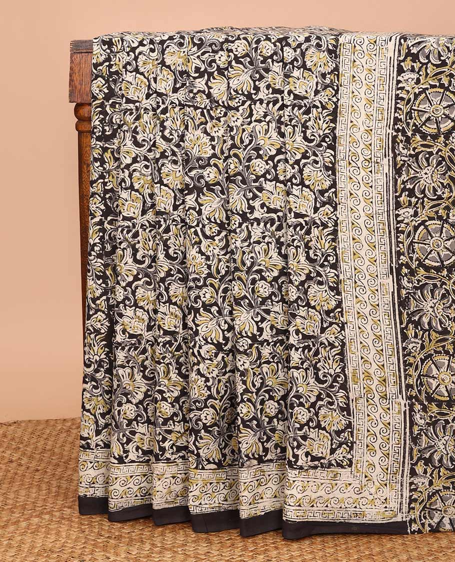 Black floral vine machine-printed Kalamkari cotton saree, geometric printed border, and pallu of floral-geometric print