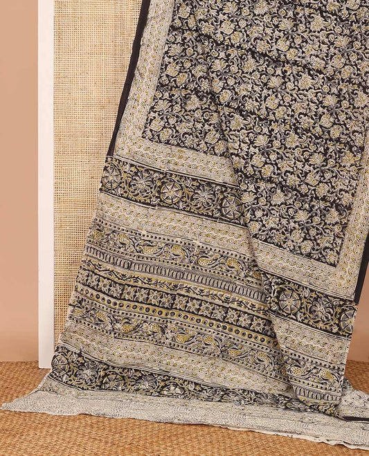 Black floral vine machine-printed Kalamkari cotton saree, geometric printed border, and pallu of floral-geometric print