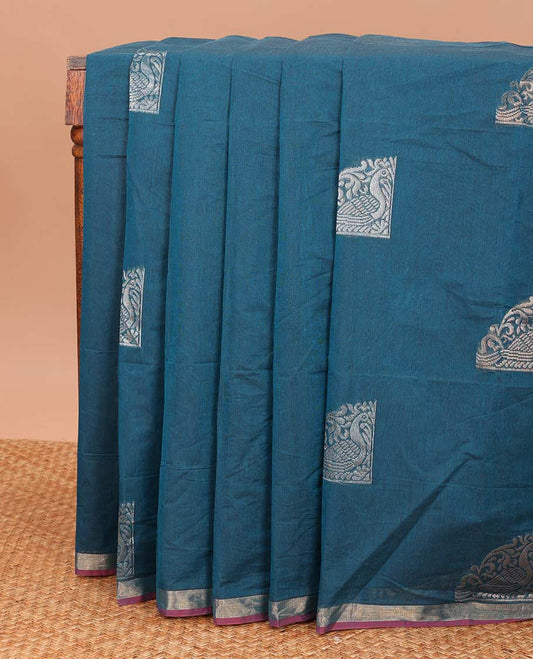 Blue zari buttas Coimbatore cotton saree, zari piping border, and pallu of Mughal style peacock designs