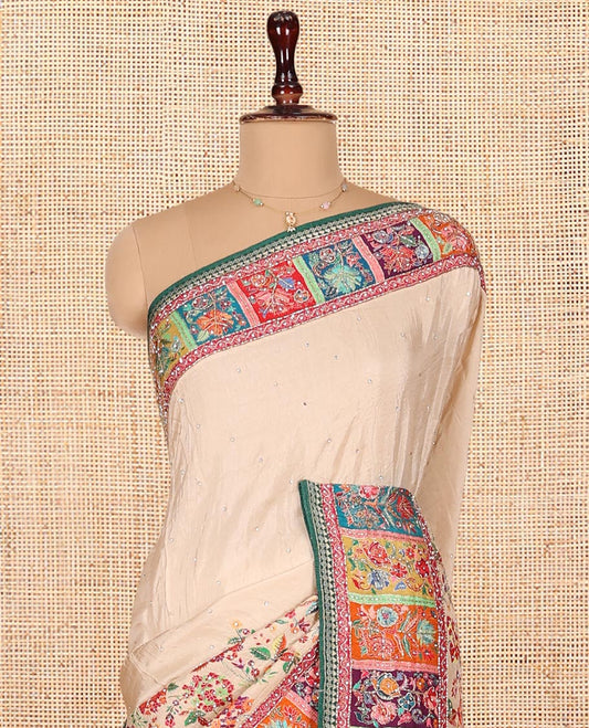 Cream Dola Silk Saree, Enthralled with Stone Struck on Its Body, Complemented by Contrast Kaleidoscopic-Colored Floral Print and Outline Embroidered Border, Pallu Mirroring the Same Design, and Paired with a Contrast Blouse