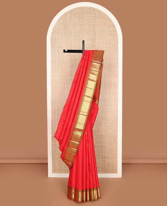 Red striped and zari buttas Kanchipuram silk saree, contrast one-sided border of paneer sombu, banars, and mayil kann designs, and zari design pallu