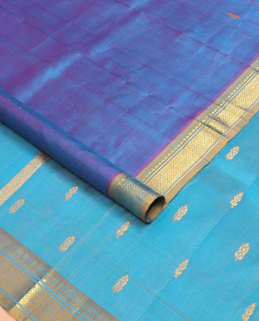 Blue zari buttas kanchipuram silksaree, contrast one-sided border of rekku,banaras & mayil kann & zari design pallu