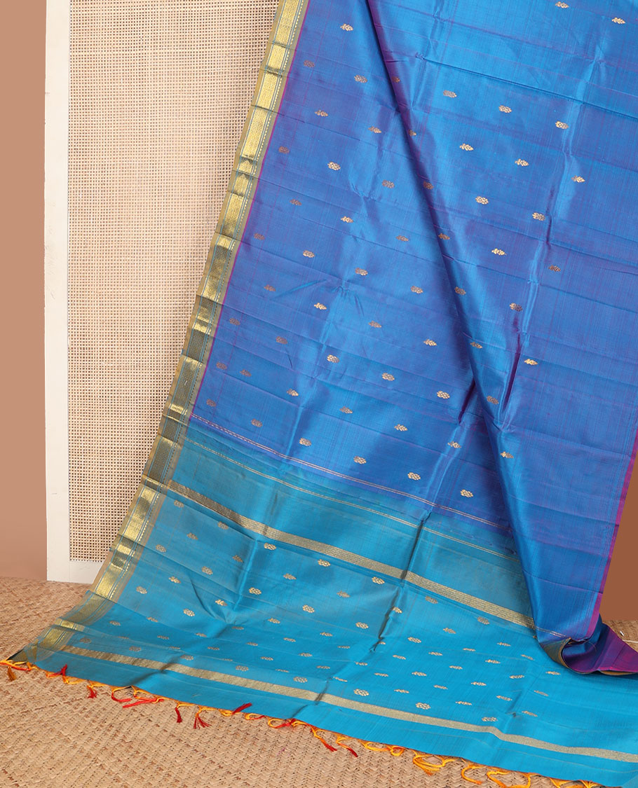Blue zari buttas kanchipuram silksaree, contrast one-sided border of rekku,banaras & mayil kann & zari design pallu
