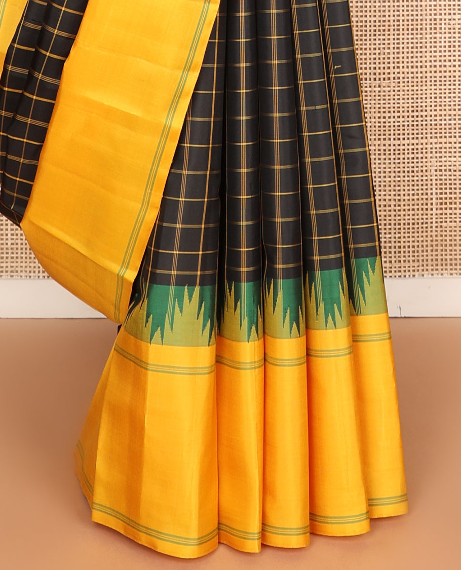Black checked kanchipuram silksaree,contrast rettai pettu striped thazampoo rekku border & pallu of stripes & pillaiyar mokku design