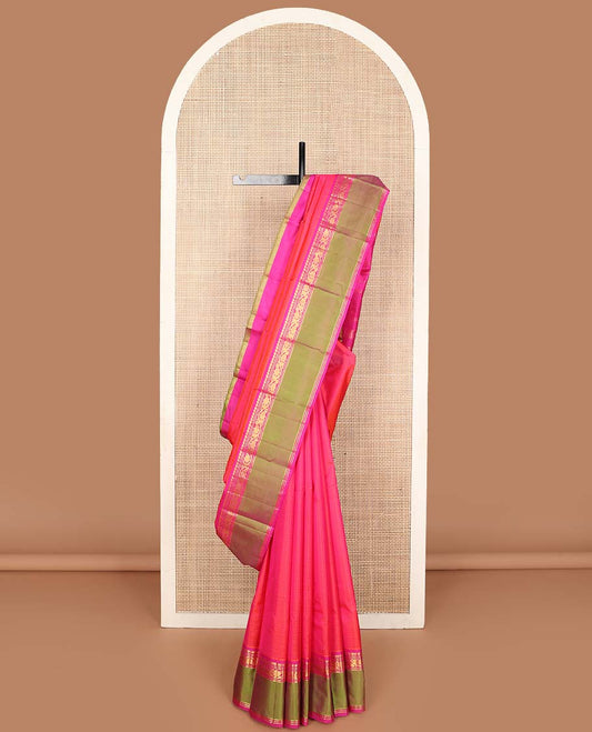 Pink striped Kanchipuram silk saree, contrast rettai pettu border of manga, muthu, banaras, and kodi vsiry designs, and zari striped pallu
