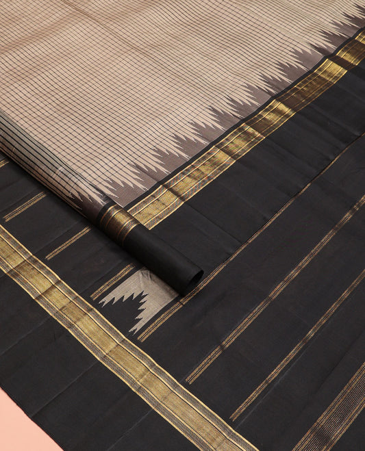 Beige checked Kanchipuram silk saree, contrast thazampoo rekku border of zari designs, and pallu of pillaiyar mokku designs