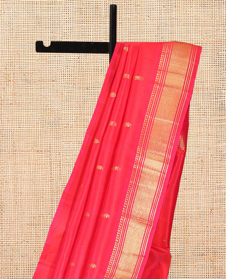 Red Kanchipuram Silk Saree, Decorated with Zari Buttas, Highlighted by a Zari Border of Panner Sombu, Banaras, Muthu, and Jaal Design, Pallu of Zari Design, and No Blouse