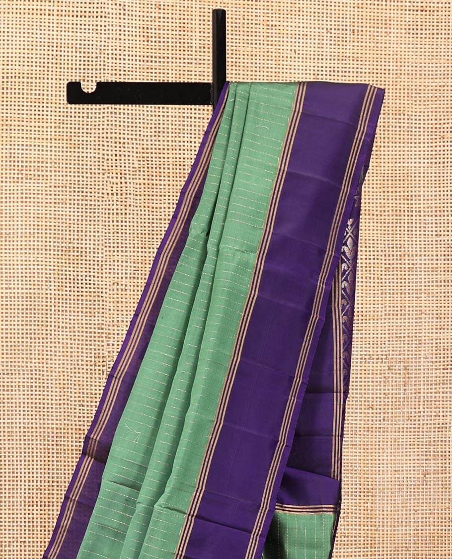 Green Mayuri Lite Silk Mix Saree, Sparsely Sparkled with Muthu Stripes on Its Body, Complemented by a Contrast Border, Jaal Pallu, and Paired with a Contrast Blouse