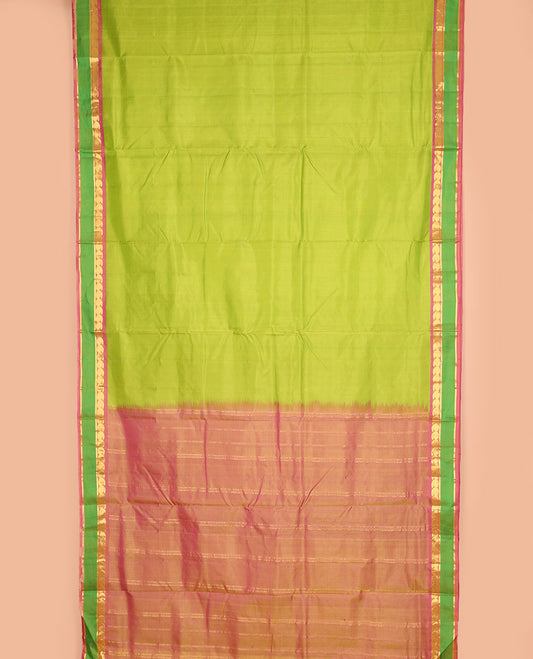 Leaf green vazhaipoo striped ten-yard silk saree, contrast rettai pettu border of kathir & kuyil kann manga design & zari striped pallu