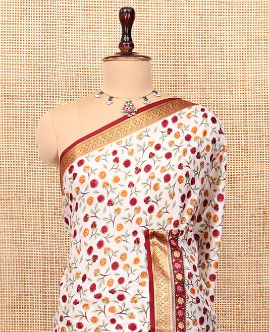 Cream Printed Silk Saree Beautified with a Floral Print, Contrast Traditional Zari Border, Striped Pallu, and Contrast Blouse